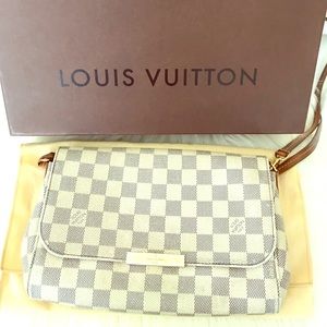 Louis Vuitton shoulder bag / clutch
